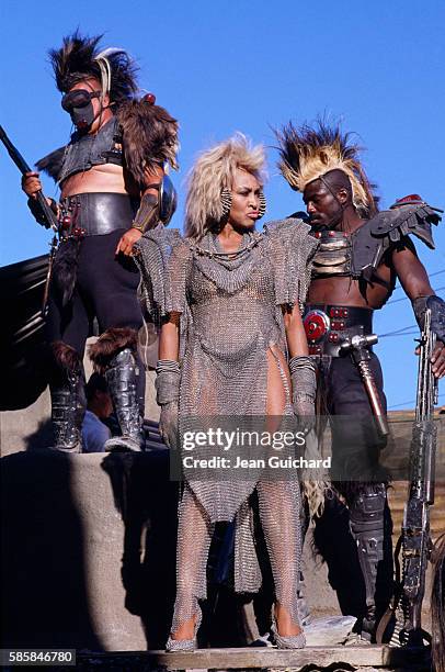 American singer and actress Tina Turner on the set of the 1985 movie Mad Max Beyond Thunderdome, directed by George Miller and George Ogilvie.