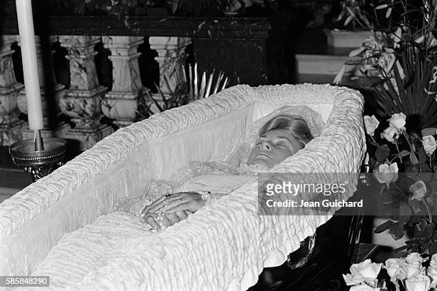 Princess Grace of Monaco lying in state in open wooden coffin after her death in a car crash on September 14.