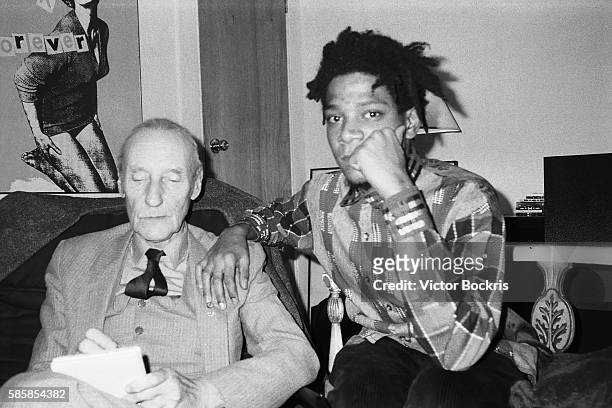 William Burroughs and Jean Michel Basquiat in New York City around Christmas of 1986.