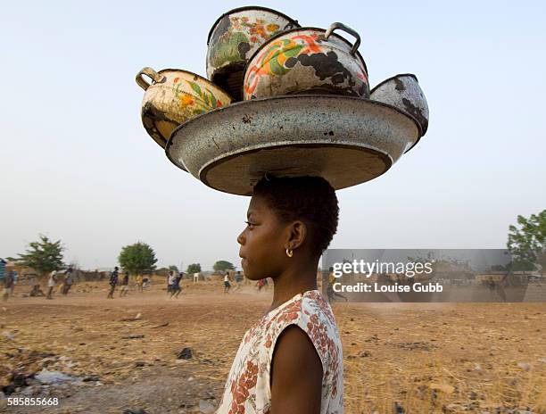 Hubeida Iddirisu sells charcoal to her community in the evenings, to pay for her school fees and support her grandmother and siblings. Iddirisu...