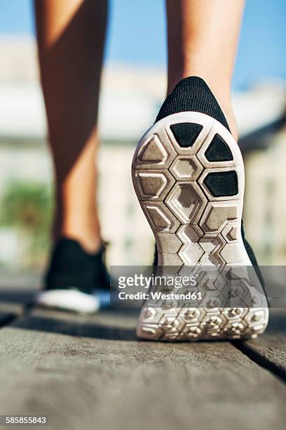 sole of sports shoe, close-up - woman soles stockfoto's en -beelden