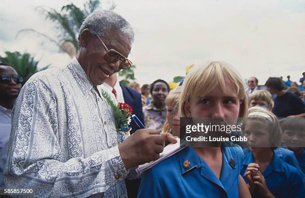 Nelson Mandela visits Fleur Primary School where non-whites are now allowed to attend. Former President of South Africa and longtime political...
