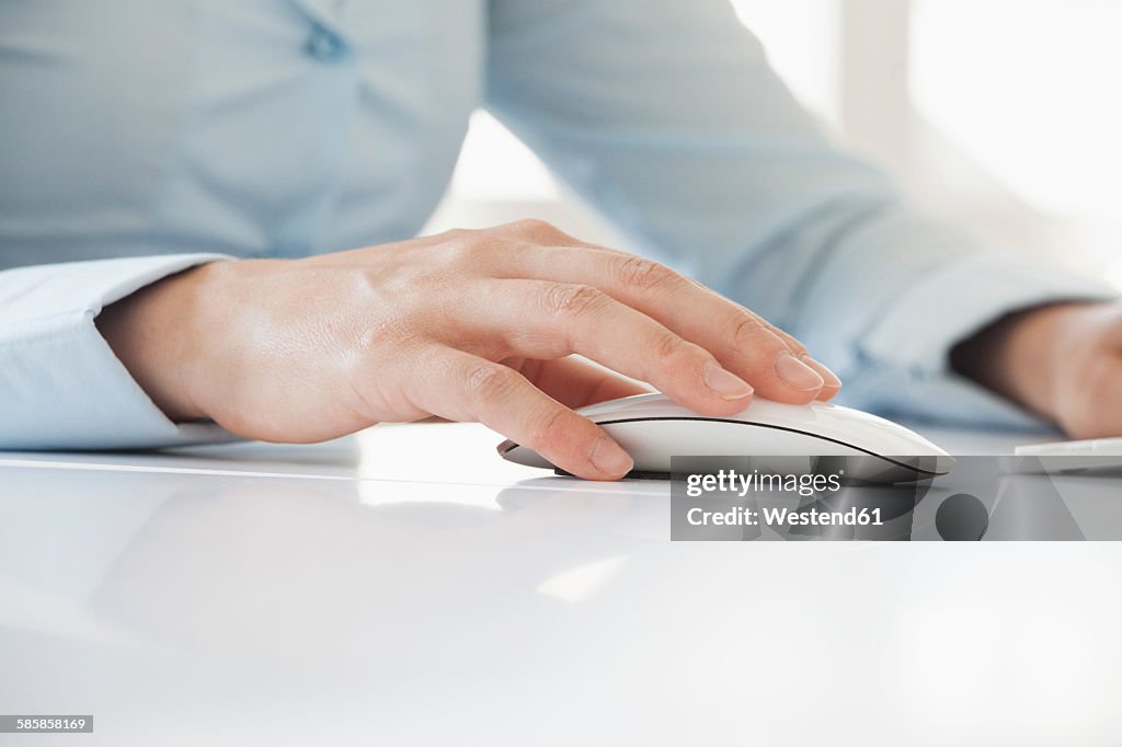 Hand Using Small Computer Mouse Closeup Of Womans Hand Using Computer Mouse High-Res Stock Photo ...