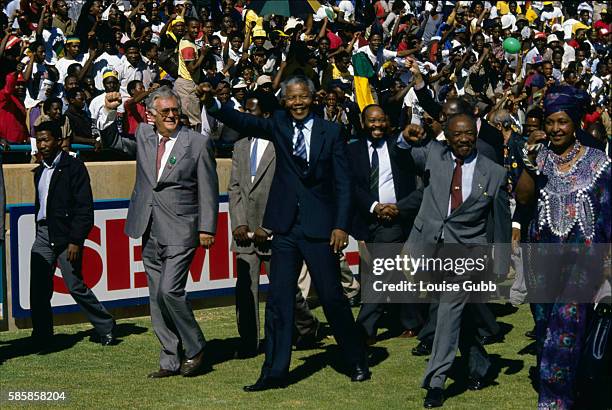 Political leaders during the welcome home rally for Nelson Mandela and the ANC. From left are: Joe Slovo, Nelson Mandela, Jacob Zuma, Alfred Nzo, and...