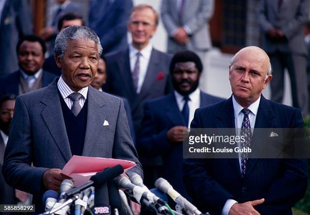 Nelson Mandela and President F.W. De Klerk make opening press statements during the first talks between the South African government and the ANC....