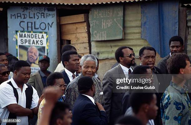 President Nelson Mandela tours the poverty stricken township of Alexandra in Johannesburg. President of South Africa and longtime political prisoner,...