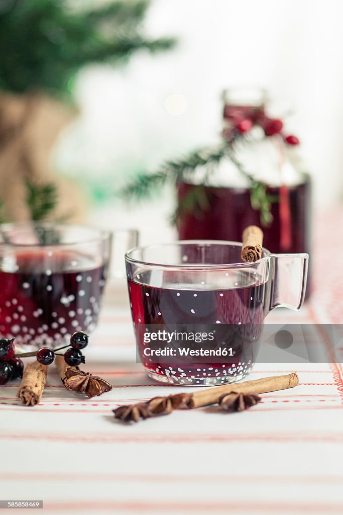 Glasses of mulled wine and spices