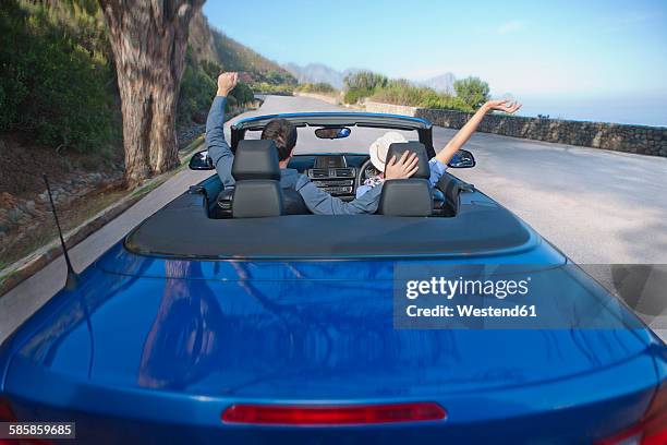 south africa, happy couple in a convertible - toyota south africa motors stock pictures, royalty-free photos & images