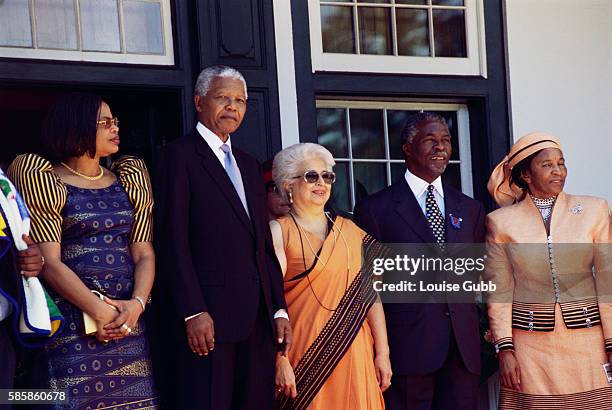 Nelson Mandela and wife Grace Machel with Thabo Mbeki and his wife Zanele Mbeki in South Africa.