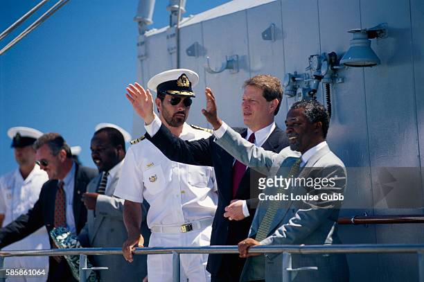 American Vice President Al Gore and South African President Thabo Mbeki sail aboard a navy vessel from Robben Island, South Africa.