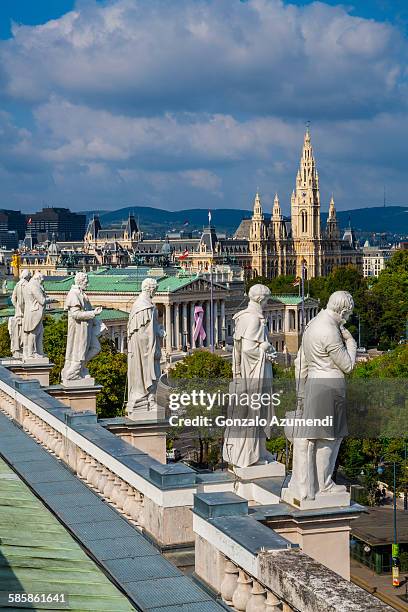 view of austrian parliament building and city hall - vienna city hall stock-fotos und bilder