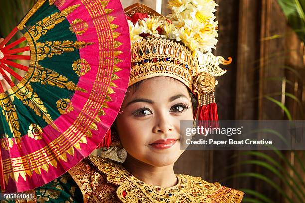 young balinese girl in dance costume with fan - folding fan stock pictures, royalty-free photos & images