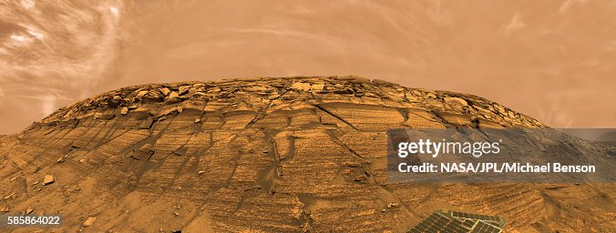 Clouds Above Mars Crater Rim Cliff