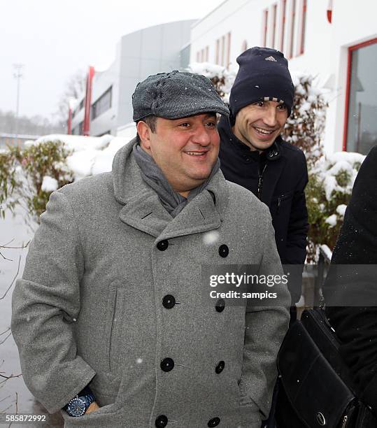 Mark van Bommel of Munich and his advisor Mino Raiola on their way to negotiations with the Bayern MUnich executives in Munich, Germany.
