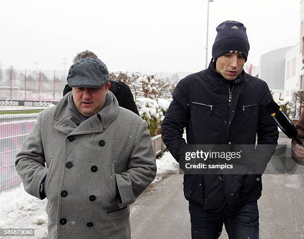 Mark van Bommel of Munich and his advisor Mino Raiola on their way to negotiations with the Bayern MUnich executives in Munich, Germany.
