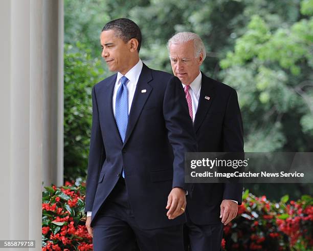 President Obama arrives with Vice President Joe Biden, to sign the Family Smoking Prevention and Tobacco Control Act, a historic legislation granting...