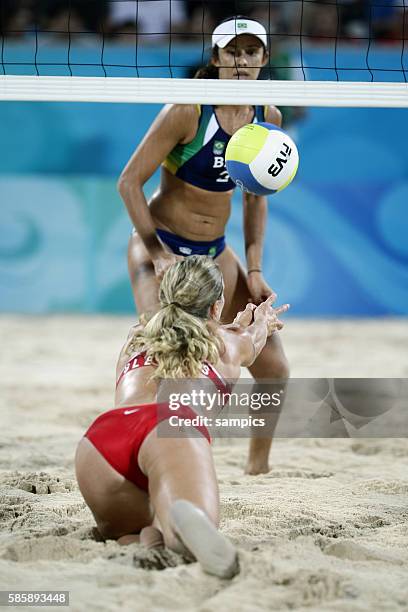 Susanne GLESNES with Talita ROCHA during the Beach Volleyball match Brazil vs. Norway.