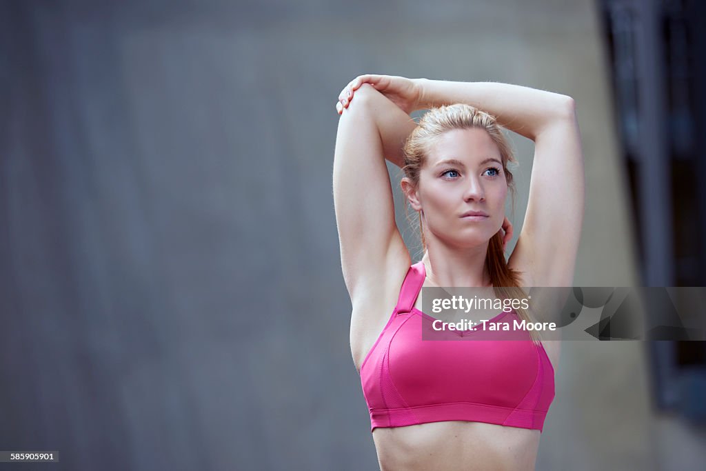 Sports woman stretching