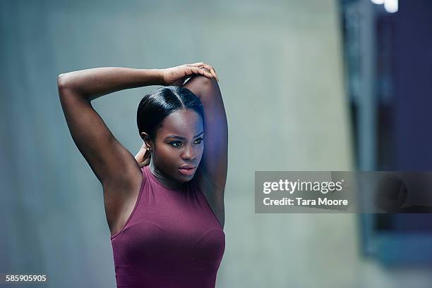 sports woman stretching - of brown hair with highlights stock pictures, royalty-free photos & images