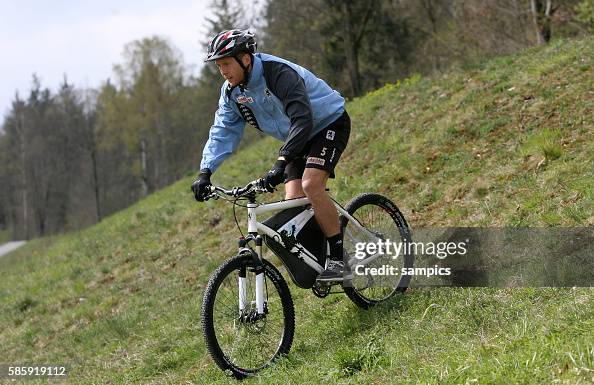 Gregg Berhalter riding his mountain bike at the