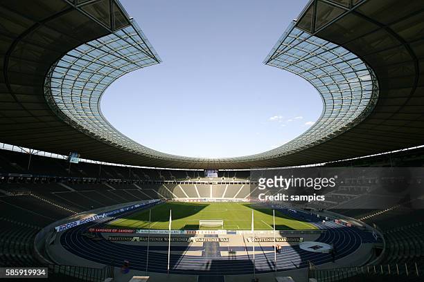 Inside view of the empty "Olympia Stadion" Olympic Arena in Berlin, Germany. It famously hosted events like the 1936 Summer Olympics, the 2006 FIFA...