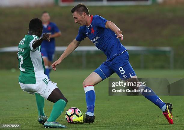 Slavia PrahaÕs midfielder Jaromir Zmrhal with Rio Ave FCÕs defender Eliseu Cassama in action during the UEFA Europa League Qualifications Semi-Finals...