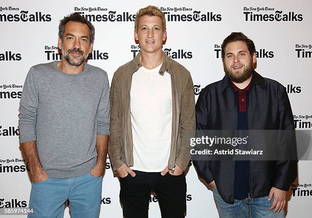 Director Todd Phillips poses with actors Miles Teller and Jonah Hill during TimesTalks Presents The Cast of "War Dogs" at The Times Center on August...