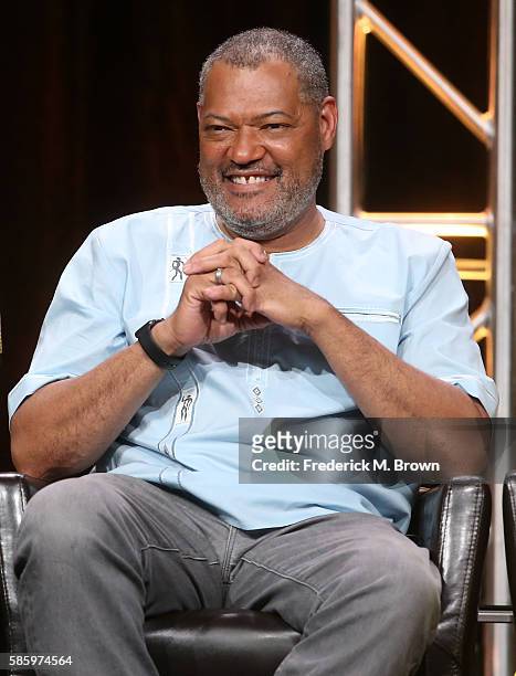 Actor Laurence Fishburne speaks onstage at the 'Black-ish' panel discussion during the Disney ABC Television Group portion of the 2016 Television...