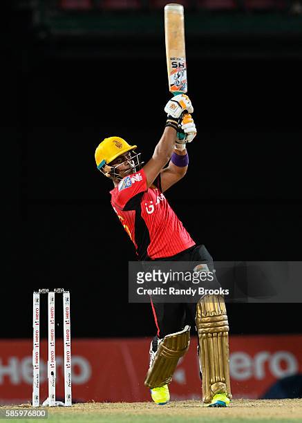 Basseterre , Saint Kitts and Nevis - 4 August 2016; Umar Akmal of Trinbago Knight Riders hits 6 during the Hero Caribbean Premier League Play-off -...