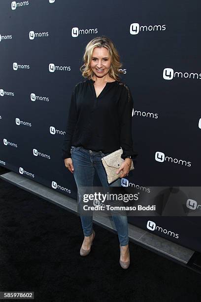 Actress Beverley Mitchell attends the 4moms Car Seat launch event at Petersen Automotive Museum on August 4, 2016 in Los Angeles, California.