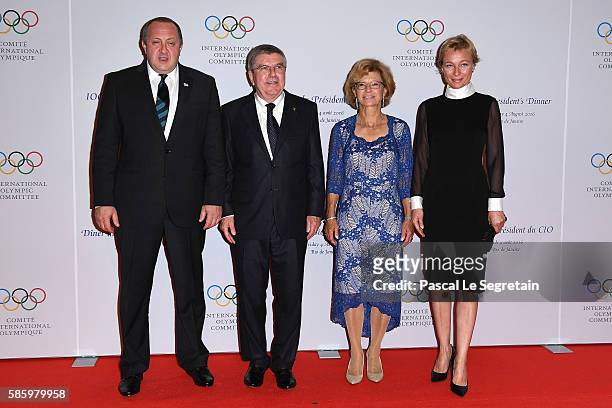 President of Gorgia Giorgi Margvelashvili and wife pose with I.O.C president Thomas Bach and wife Claudia during the President's dinner at the...