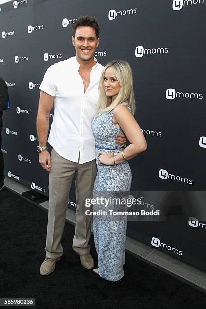 Actor Owain Yeoman and Gigi Yallouz attend the 4moms Car Seat launch event at Petersen Automotive Museum on August 4, 2016 in Los Angeles, California.