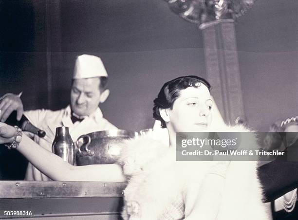 Vintage Image of Woman Sitting At Bar