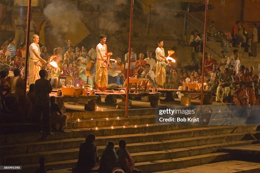 Men Lighting Candles for Diwali