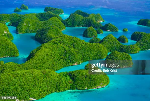rock formations and islets of the rock islands - oceania foto e immagini stock