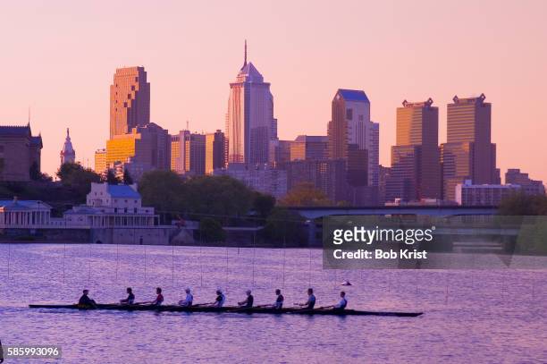 rowers on schuylkill river in philadelphia - fluss schuylkill stock-fotos und bilder