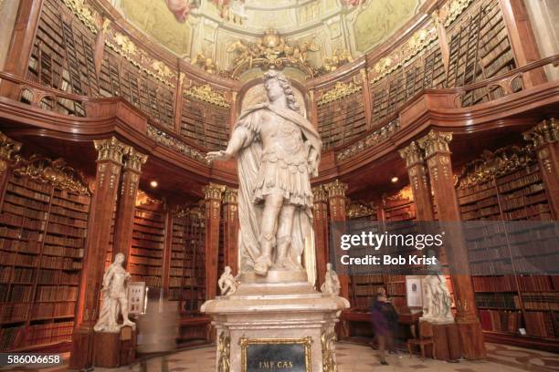 statue in austrian national library - cultura austriaca foto e immagini stock