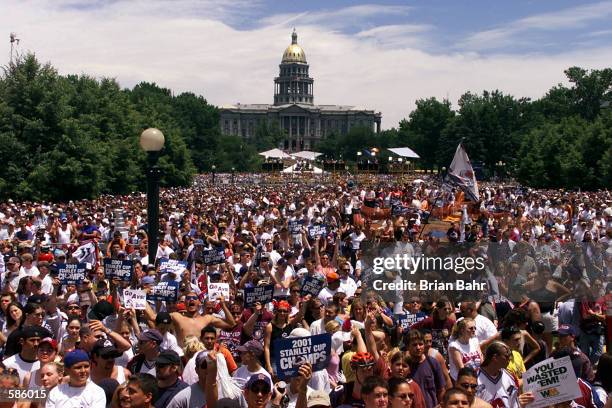 Several hundred thousand fans cheer on the Colorado Avalanche at Civic Park in downtown Denver, Colorado to celebrate the Avalanche winning the 2001...