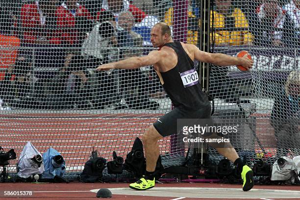 Diskuswerfen Discus men Robert Harting GER Olympiasieger olympic Champion Goldmedalist Gold Olympische Sommerspiele in London 2012 Olympia olympic...