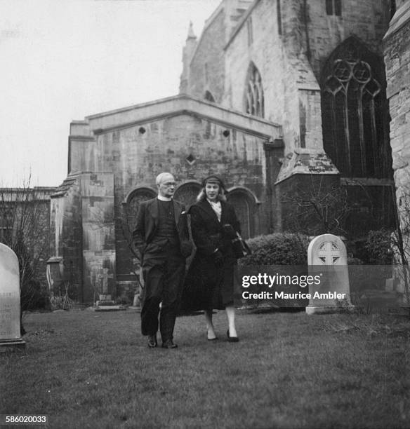 Roberta Cowell , with friend and advisor Canon Arthur Russell Millbourn of Bristol Cathedral, March 1954. Roberta was once a Spitfire pilot, prisoner...