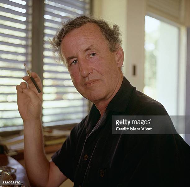 Novelist Ian Fleming, creator of James Bond 007, sits at his typewriter while in Jamaica for the filming of the movie Dr. No.
