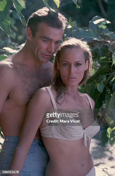 Actors Sean Connery and Ursula Andress stand together in Jamaica during the filming of Dr. No.