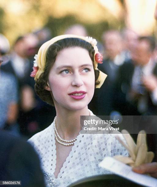 Young Princess Margaret of the United Kingdom wears a spring bonnet.