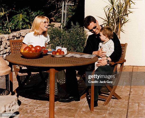 Game show host Todd Newton and family are photographed for InTouch Weekly in 2003 at home in Los Angeles, California. PUBLISHED IMAGE.