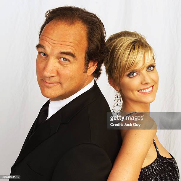 Actors Courtney Thorne-Smith and Jim Belushi are photographed for Emmy Magazine at the 55th Annual Emmy Awards on September 21, 2003 in Los Angeles,...