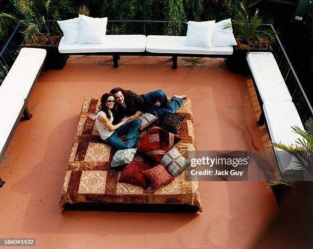 Actress Shannon Elizabeth and Joseph Reitman are photographed for InStyle Magazine in 2004 at home in Los Angeles, California. PUBLISHED IMAGE.