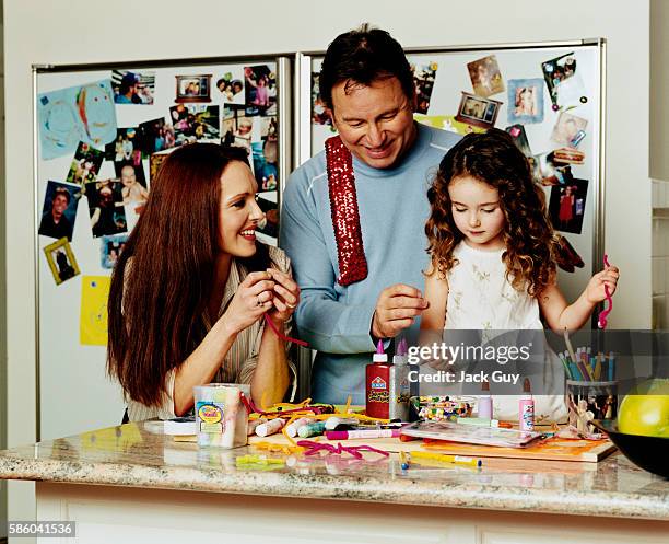 Actors John Ritter, Amy Yasbeck and daughter Stella Ritter are photographed for InStyle Magazine in 2003 at home in Los Angeles, California....