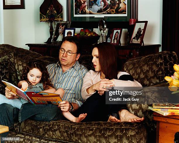 Actors John Ritter, Amy Yasbeck and daughter Stella Ritter are photographed for InStyle Magazine in 2003 at home in Los Angeles, California....