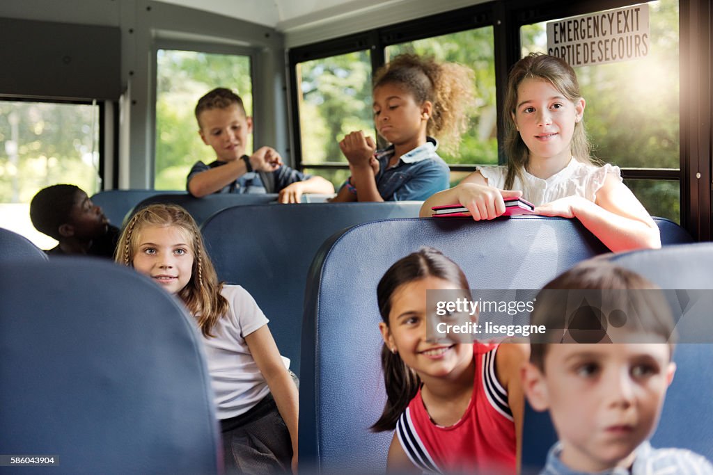 Kids Using Bus School Kids On School Bus High-Res Stock Photo - Getty Images