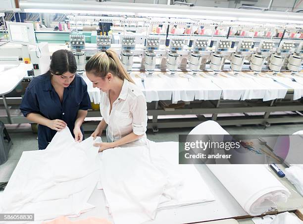 women working at an embroidery factory - textile industry stock pictures, royalty-free photos & images
